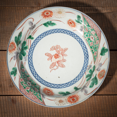 <b>A POLYCHROME FLORAL AND POMEGRANATE PORCELAIN DISH</b>