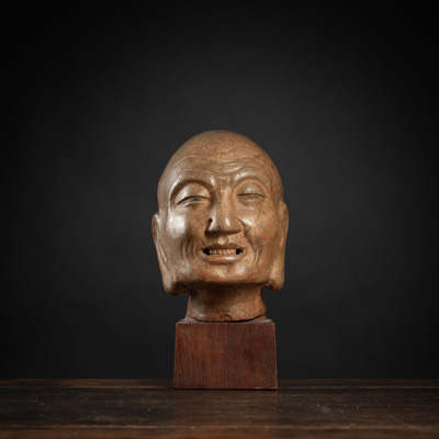 <b>A POTTERY HEAD OF A LUOHAN WITH POLYCHROME PAINTING</b>