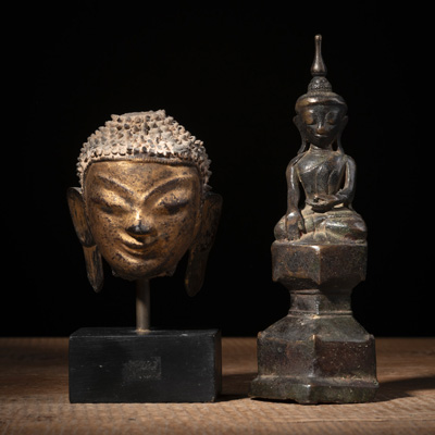 <b>A GILT BUDDHA HEAD AND A BRONZE FIGURE OF SEATED BUDDHA</b>