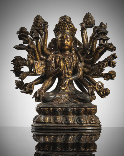 <b>A GILT AND RED LAQUERED BRONZE FIGURE OF DEITY POSSIBLY NAMASANGITTI</b>