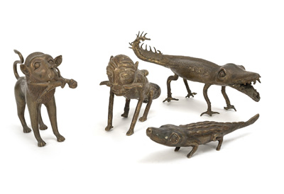 <b>Vier Tierfiguren in Messingbronze</b>