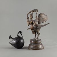 <b>A BRONZE KINARA AND A BIRD-SHAPED VESSEL</b>