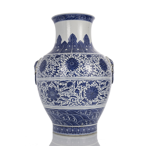 <b>A large underglaze blue vase 'hu' with lotus decoration and mascaron handles</b> <b>A large underglaze blue vase 'hu' with lotus decoration and mascaron handles</b>