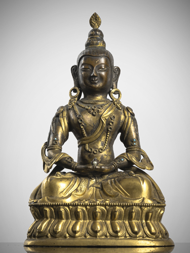 <b>A PART-GILT BRONZE FIGURE OF AMITAYUS ON A LOTUS</b>