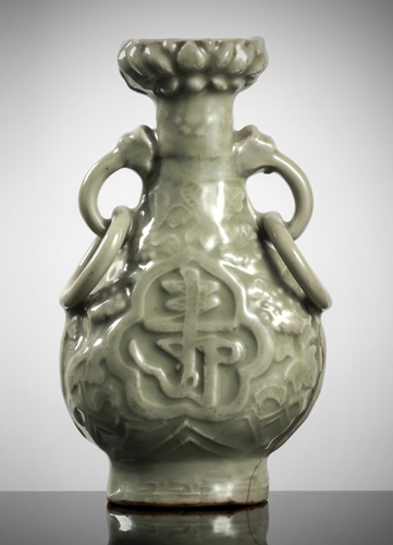 <b>A MOLDED LONGQUAN CELADON 'FU SHOU' VASE</b>
