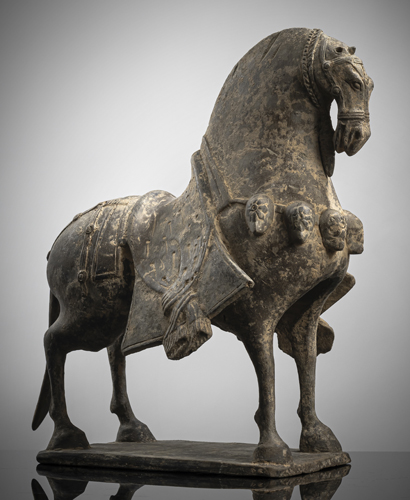 <b>A POTTERY FIGURE OF A STANDING CAPARISONED HORSE</b> <b>A POTTERY FIGURE OF A STANDING CAPARISONED HORSE</b>