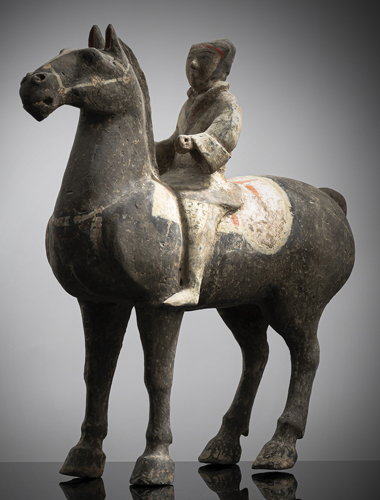 <b>A POTTERY FIGURE OF A MOUNTED HORSE</b> <b>A POTTERY FIGURE OF A MOUNTED HORSE</b>