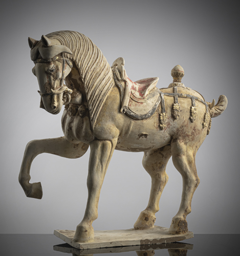 <b>A POTTERY FIGURE OF A PRANCING HORSE WITH RESIDUE OF POLYCHROME PAINTING</b> <b>A POTTERY FIGURE OF A PRANCING HORSE WITH RESIDUE OF POLYCHROME PAINTING</b>