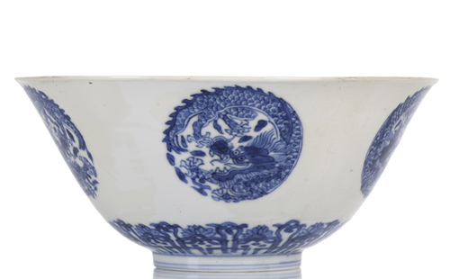 <b>A PORCELAIN BOWL WITH UNDERGLAZE BLUE DECORATION OF DRAGON MEDALLIONS AND FOLIAGE</b>