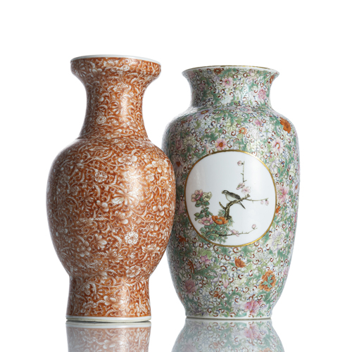 <b>Two 'Mille-Fleur' porcelain vases, one decorated in iron red</b>