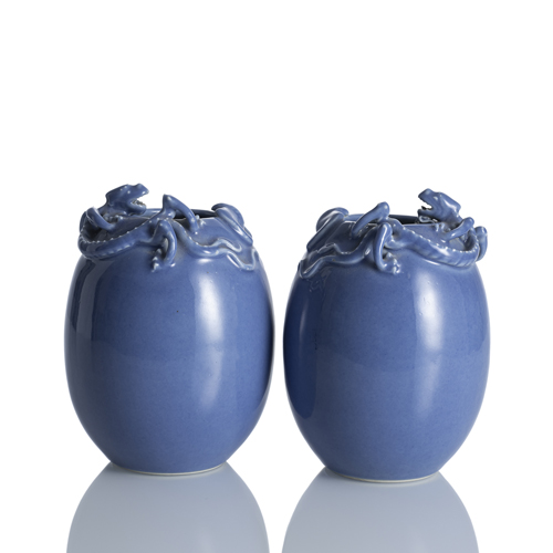 <b>A pair of powder blue porcelain vases with chilong and bat on the neck and mouth</b>