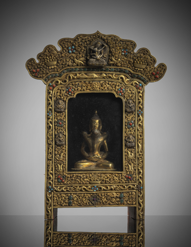<b>A wooden altar shrine with a magnificent front made of gilded silver with gemstones</b>