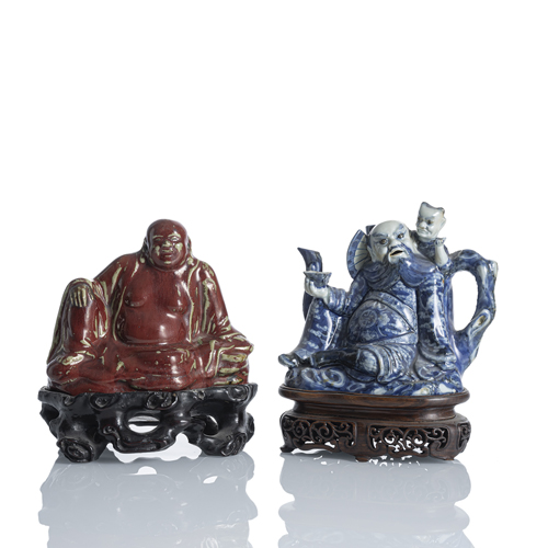 <b>A Shiwan figure of Budai and a porcelain ewer with underglaze blue decoration</b>