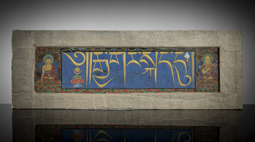 <b>A book cover with title page of a sutra in gold on an azurite blue background, miniature of Shakyamuni and Tsongkhapa on the right and left respectively</b>