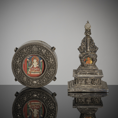 <b>A small and finely worked silver and copper stupa and a silver and metal gau with tsakli of Sitapatra</b>
