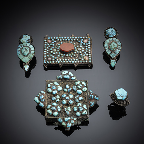 <b>Two amulet containers, a pair of earrings and a ring in silver set with turquoise</b>