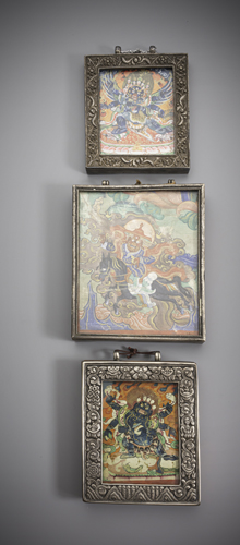 <b>Three gau, partly worked in silver and copper with tsaglis of Hevajra, Mahakala and Lhamo, partly still filled with votive offerings</b>