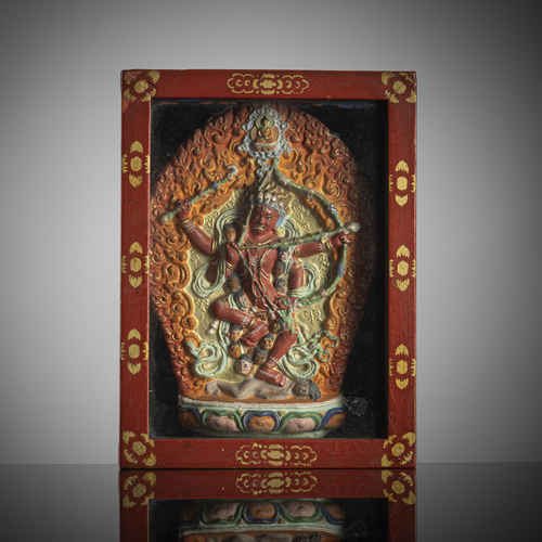 <b>A painted wooden gungervaa with a polychrome painted tsha tsha of  Kurukulla</b>