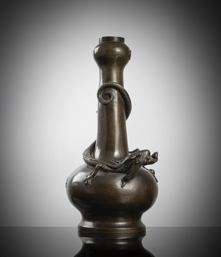<b>A BRONZE BOTTLE VASE WITH A DRAGON IN HIGH-RELIEF</b>