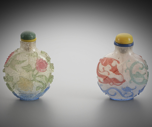 <b>Two fine snuff bottles with four-coloured overlay of chrysanthemum blossoms and foliage or chilong over snowflake glass</b> <b>Two fine snuff bottles with four-coloured overlay of chrysanthemum blossoms and foliage or chilong over snowflake glass</b>
