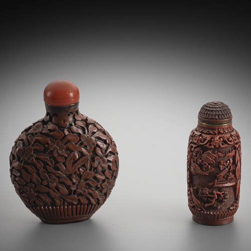<b>Two snuffbottles made of carved red lacquer with floral decoration and mountain landscape with palace complex</b> <b>Two snuffbottles made of carved red lacquer with floral decoration and mountain landscape with palace complex</b>
