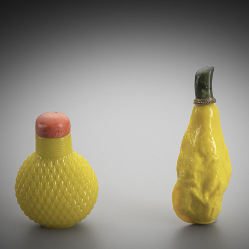 <b>Two snuffbottles made of yellow glass in the shape of a dried lemon and in the style of wickerwork</b> <b>Two snuffbottles made of yellow glass in the shape of a dried lemon and in the style of wickerwork</b>
