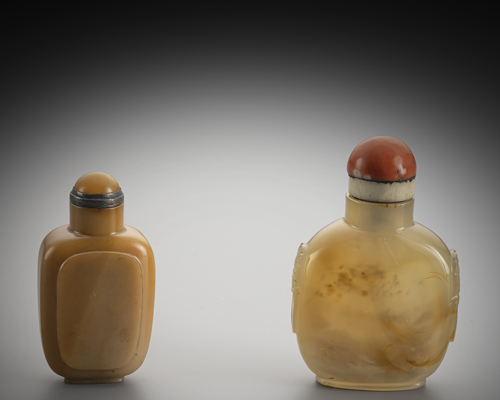 <b>Two agate snuff bottles, one with carved handles on the sides</b> <b>Two agate snuff bottles, one with carved handles on the sides</b>