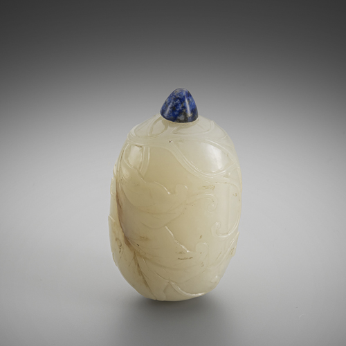 <b>Snuff bottle made of light green caramel-coloured jade in the shape of a melon with tendrils in flat relief</b> <b>Snuff bottle made of light green caramel-coloured jade in the shape of a melon with tendrils in flat relief</b>