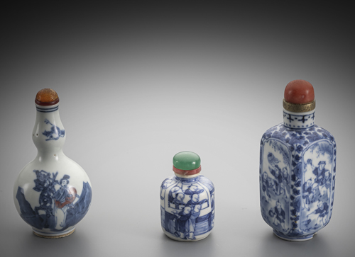<b>Three porcelain snuff bottles with underglaze blue decoration, one with copper red</b> <b>Three porcelain snuff bottles with underglaze blue decoration, one with copper red</b>