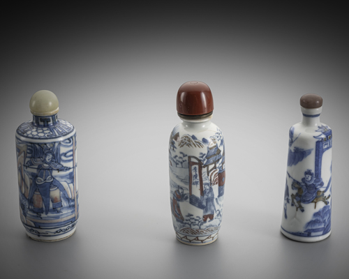 <b>Three porcelain snuff bottles in copper red and underglaze blue</b> <b>Three porcelain snuff bottles in copper red and underglaze blue</b>