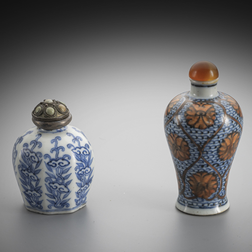 <b>A snuffbottle with lingzhi in underglaze blue and meiping with lotus decoration in orange red with underglaze blue</b> <b>A snuffbottle with lingzhi in underglaze blue and meiping with lotus decoration in orange red with underglaze blue</b>