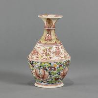 <b>A POLYCHROME BOTTLE VASE</b>