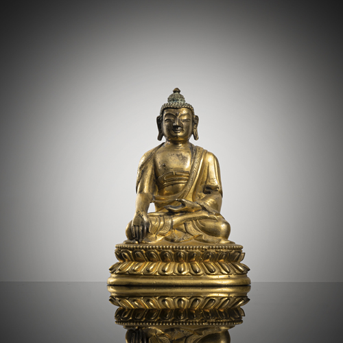 <b>A GILT-BRONZE FIGURE OF BUDDHA SHAKYAMUNI</b>