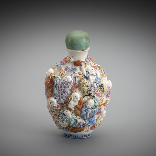 <b>A finely modelled snuff bottle made of biscuit porcelain with immortals, coloured enamel</b> <b>A finely modelled snuff bottle made of biscuit porcelain with immortals, coloured enamel</b>