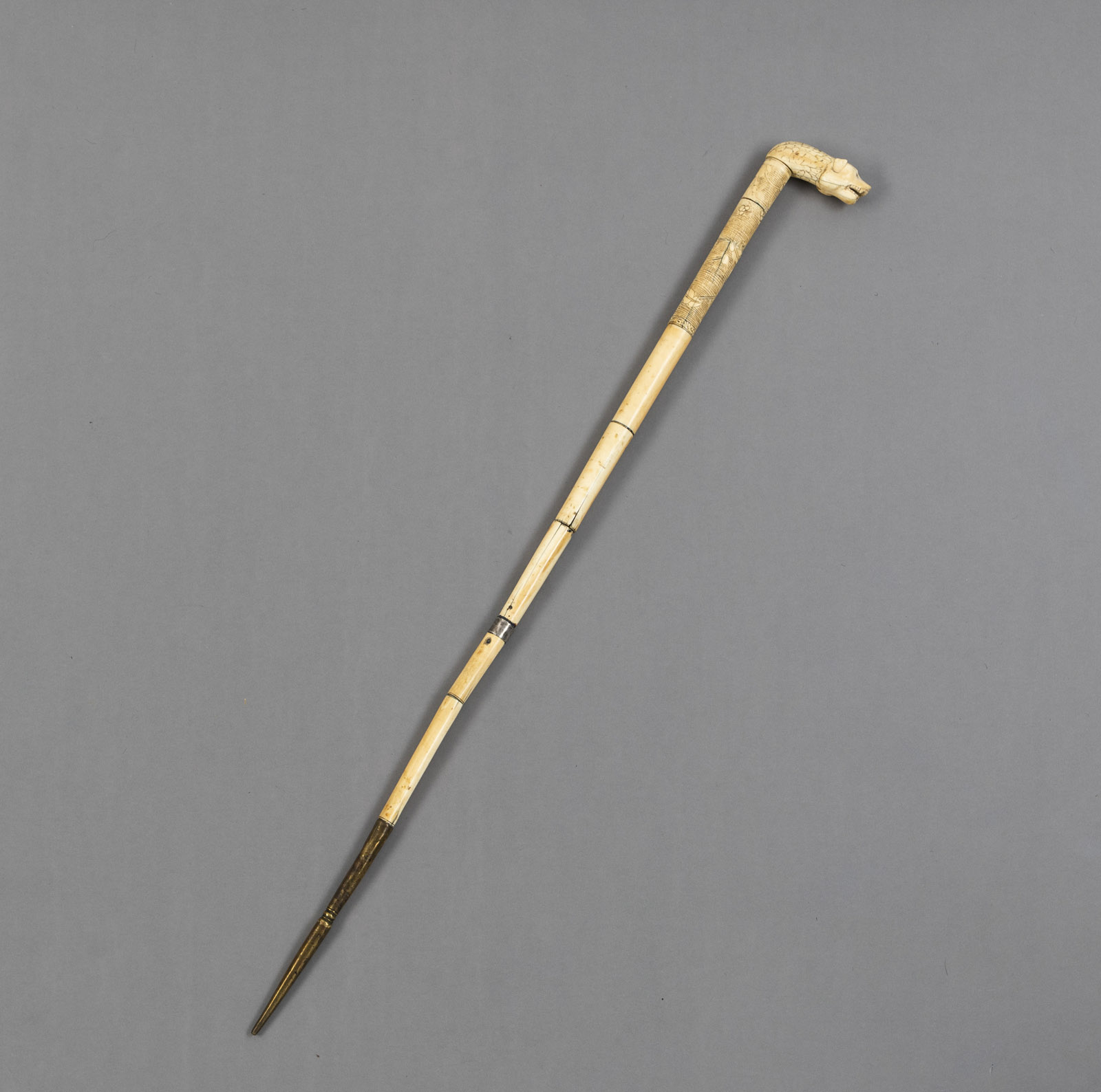 <b>AN IVORY AND LOW-ALLOY SILVER CANE</b>