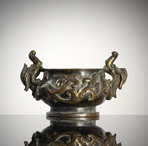 <b>A RARE PARCEL-GILT BRONZE INCENSE BURNER WITH MAKARA HANDLES</b>
