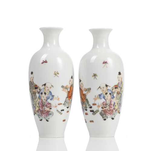 <b>A pair of porcelain vases with fine decoration of boys and figures</b> <b>A pair of porcelain vases with fine decoration of boys and figures</b>