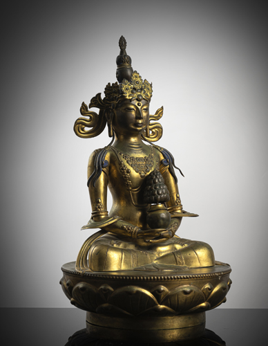 <b>A PART-GILT REPOUSSÉ FIGURE OF AMITAYUS ON A LOTUS</b>