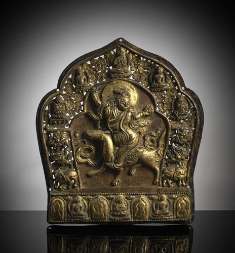 <b>A GILT-COPPER PLAQUE EMBOSSED WITH A FEMALE DIVINITY</b>