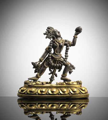 <b>A SILVER AND GILT-BRONZE FIGURE OF SARVABUDDHADAKINI</b>