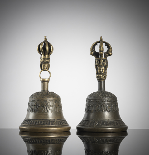 <b>Two bronze ghanta with partly gilded bronze handles</b>