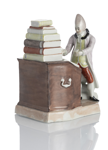 <b>Kaufmann vor seinem Schreibpult</b>