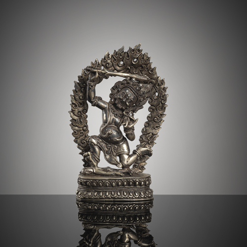 <b>A fine filigree silver figure of Acala on a lotus</b>