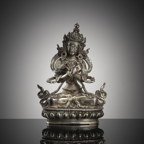 <b>A siilver figure of Vajardhara on a lotus</b>