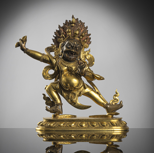 <b>A fine gilt-bronze of Vajrapani on a lotus</b>