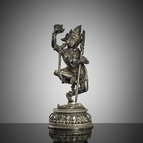 <b>A fine silver figure of Vajravarahi on a lotus</b>