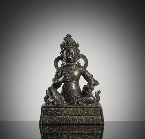 <b>A BRONZE FIGURE OF KUBERA</b>