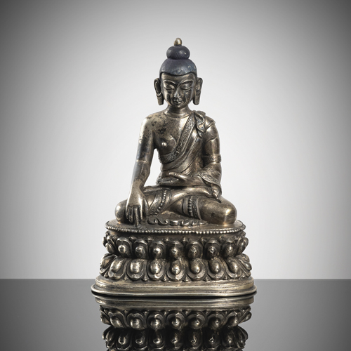 <b>A silver figure of Buddha Shakyamuni on a lotus</b>