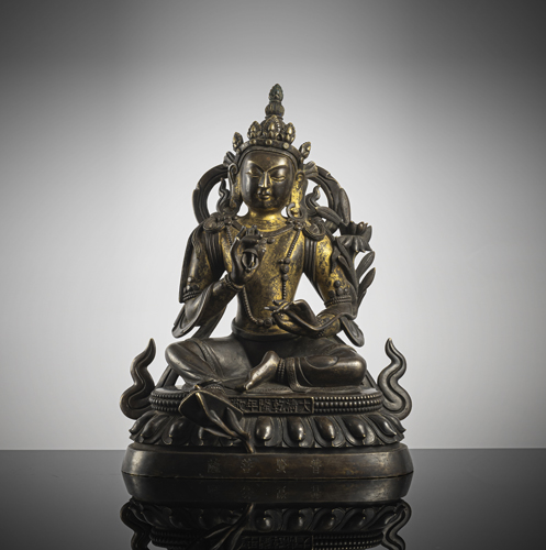 <b>A PARCEL-GILT BRONZE FIGURE OF SAMANTHABADRA</b>