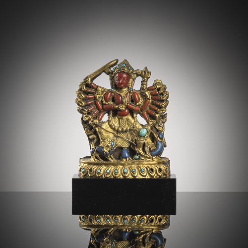 <b>A rare gilt-copper figure of Durga Mahuishamardini</b>